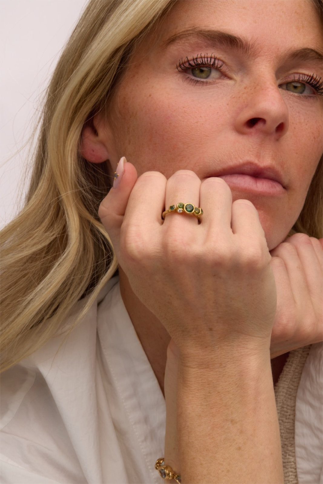 Emily Nixon Green Round Sapphire White Round Diamond Cluster Ring