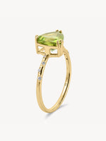 Starry Peridot Trillion Ring